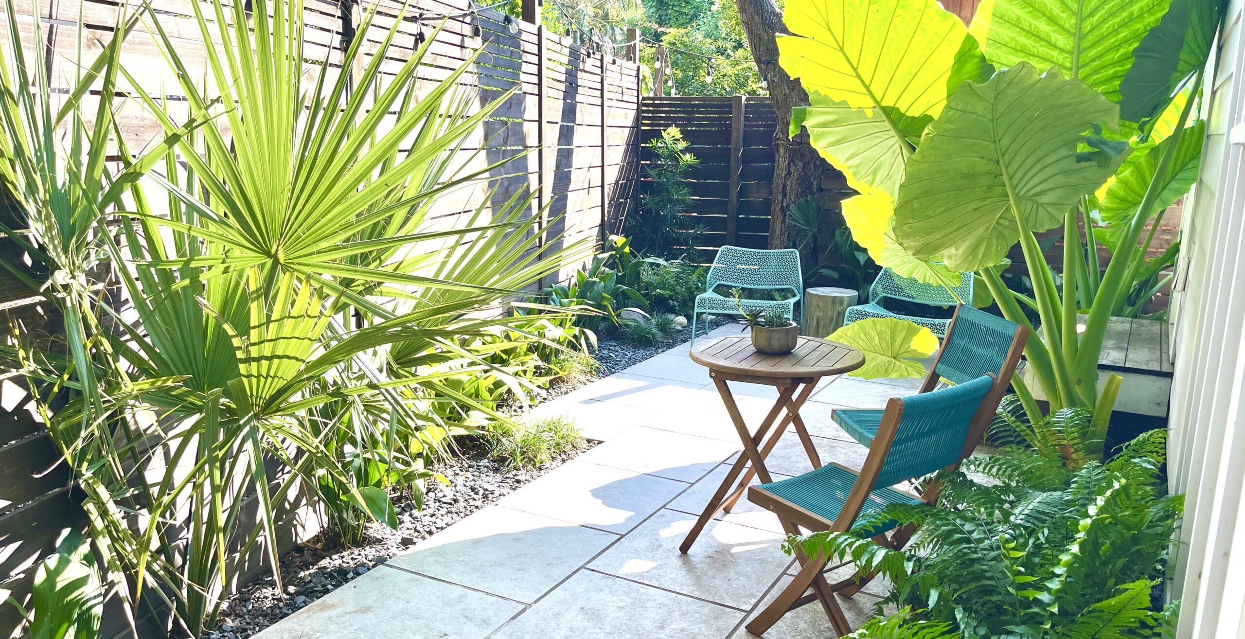 A Dreamer and Her Craftsman tropical landscaping and patio install.